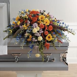 Colorful memories casket spray